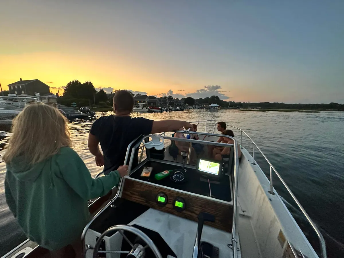 Entering Westport Harbor at sunset — the maritime tradition of the Swift and Perry families