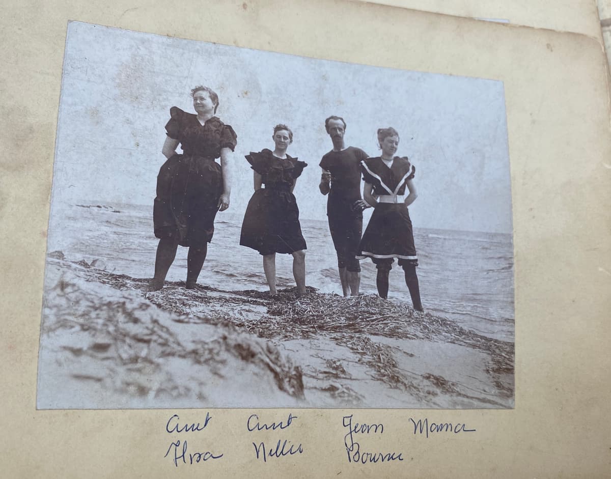 Four at the shore in bathing suits