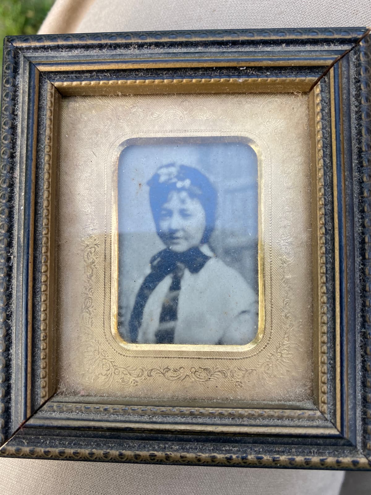 Mama in the attic dress, in its frame