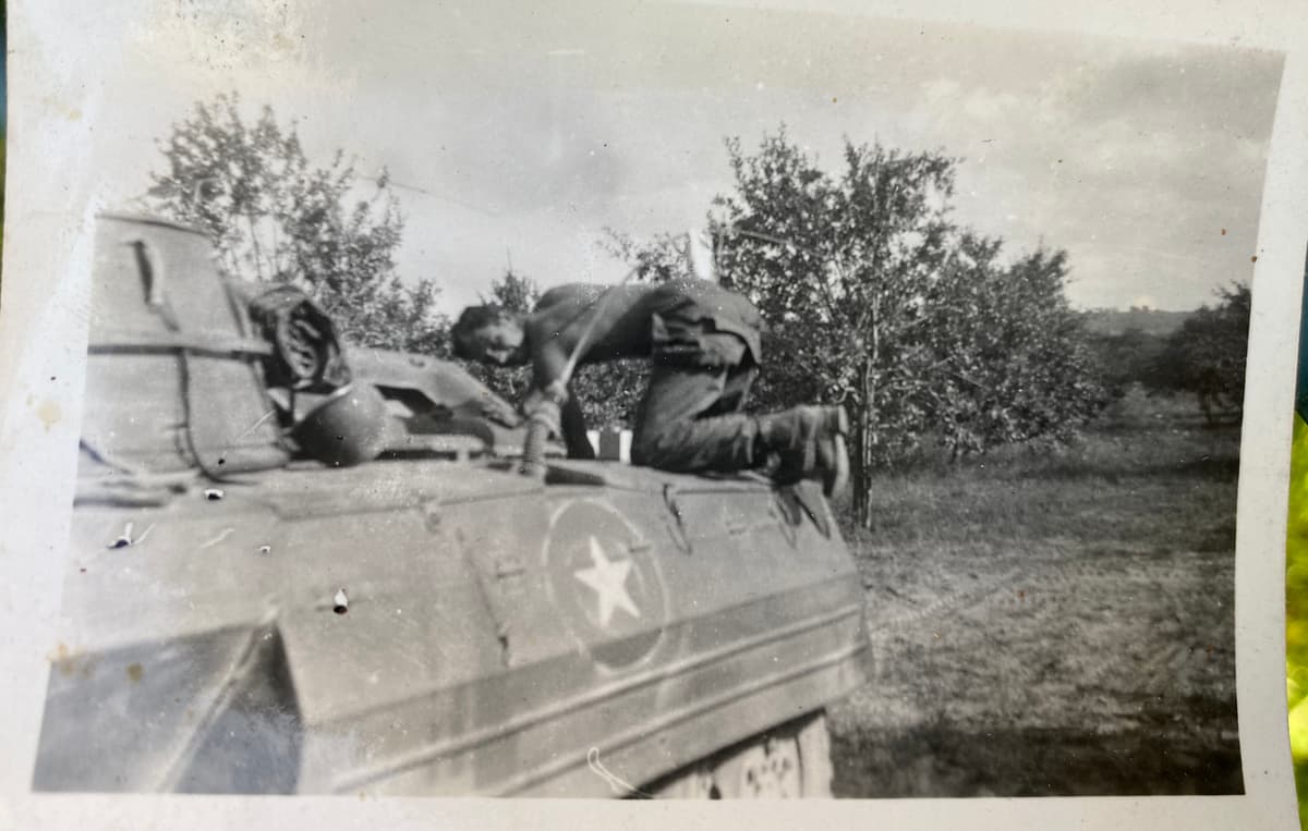 Probably Francis Swift Perry on a tank, WWII