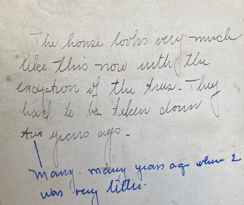 Back of homestead photo with childhood memory note