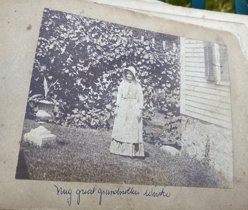 Great-Grandmother Winter standing in garden, Fall River